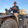 Isaac Boone working deer food plots